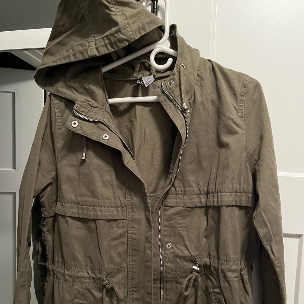 Women’s olive green jacket with silver accents size 6